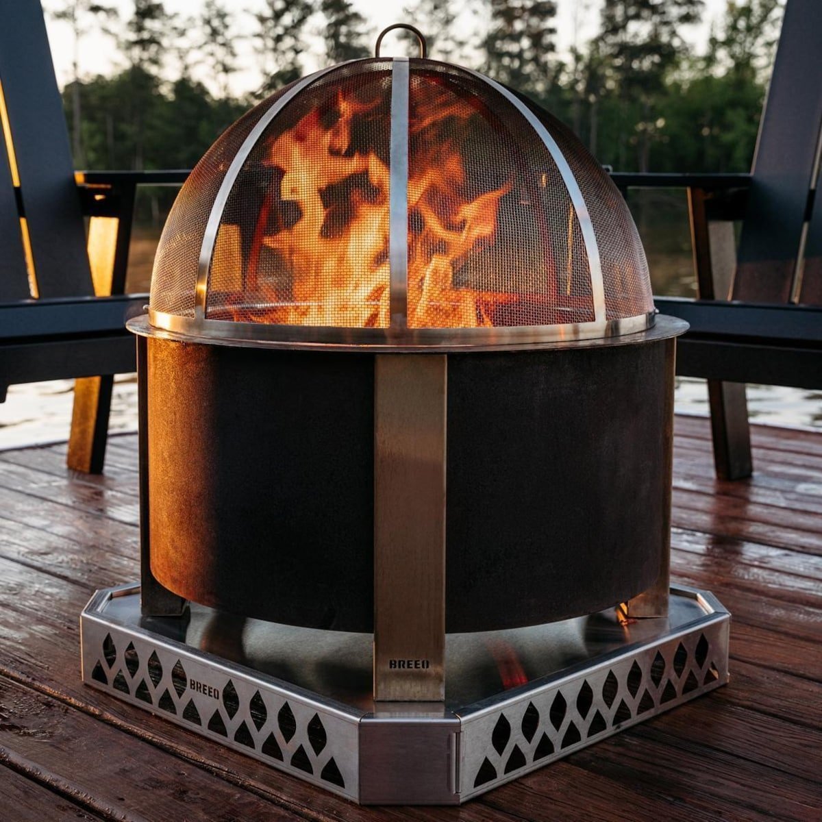 X Series 28 Inch Round Corten Steel Wood-Burning Fire Pit in Stainless Steel by Breeo